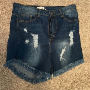 Denim fringed shorts